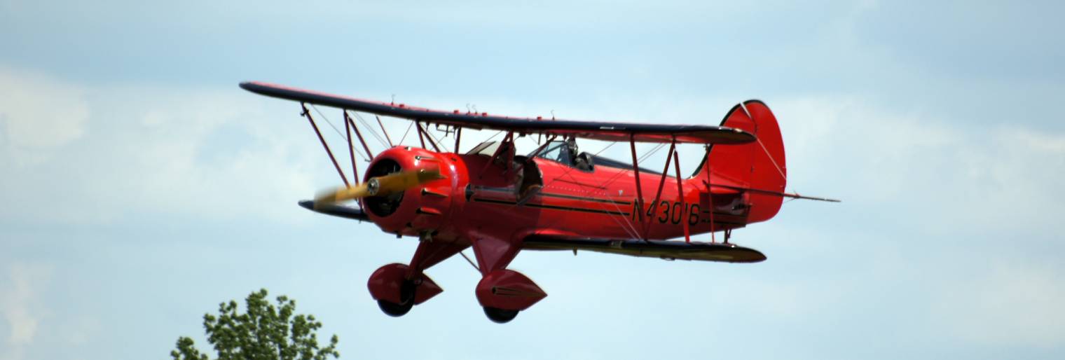 Waco Biplane flying over Troy Strawberry Festival